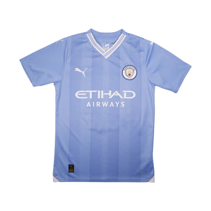 Manchester City 2023/24 home shirt front view with Etihad Airways sponsor and crest