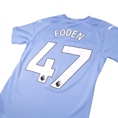 Close-up of Foden 47 printing and Premier League badges on the back of the shirt