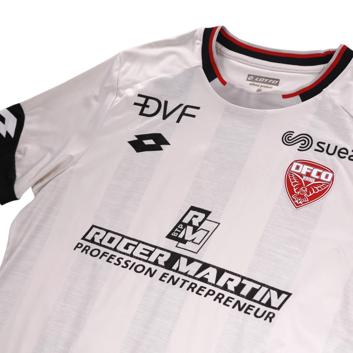 Close-up of Lotto neck label and size M tag on Dijon FCO away shirt