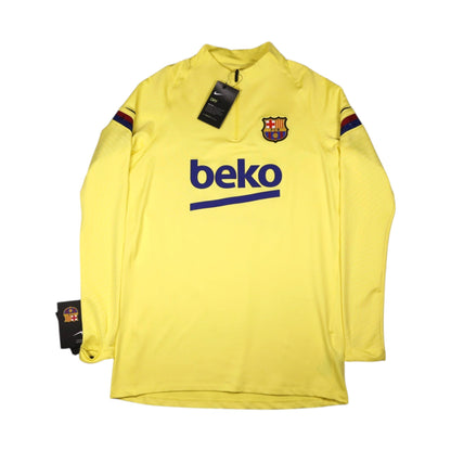 Front view of 2019/20 Barcelona Nike yellow training top with Beko sponsor and crest