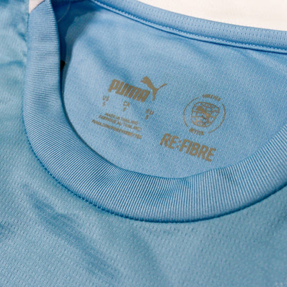 Close-up of the neck label showing Puma branding, size S and Re:Fibre mark