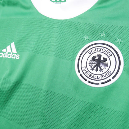 Close-up of the DFB crest, three stars and adidas logo on the 2012/13 Germany away shirt