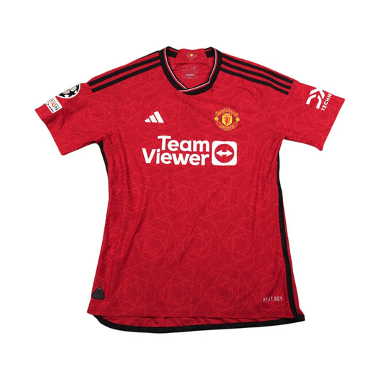 2023/24 Manchester United adidas home shirt, front view with TeamViewer sponsor and crest