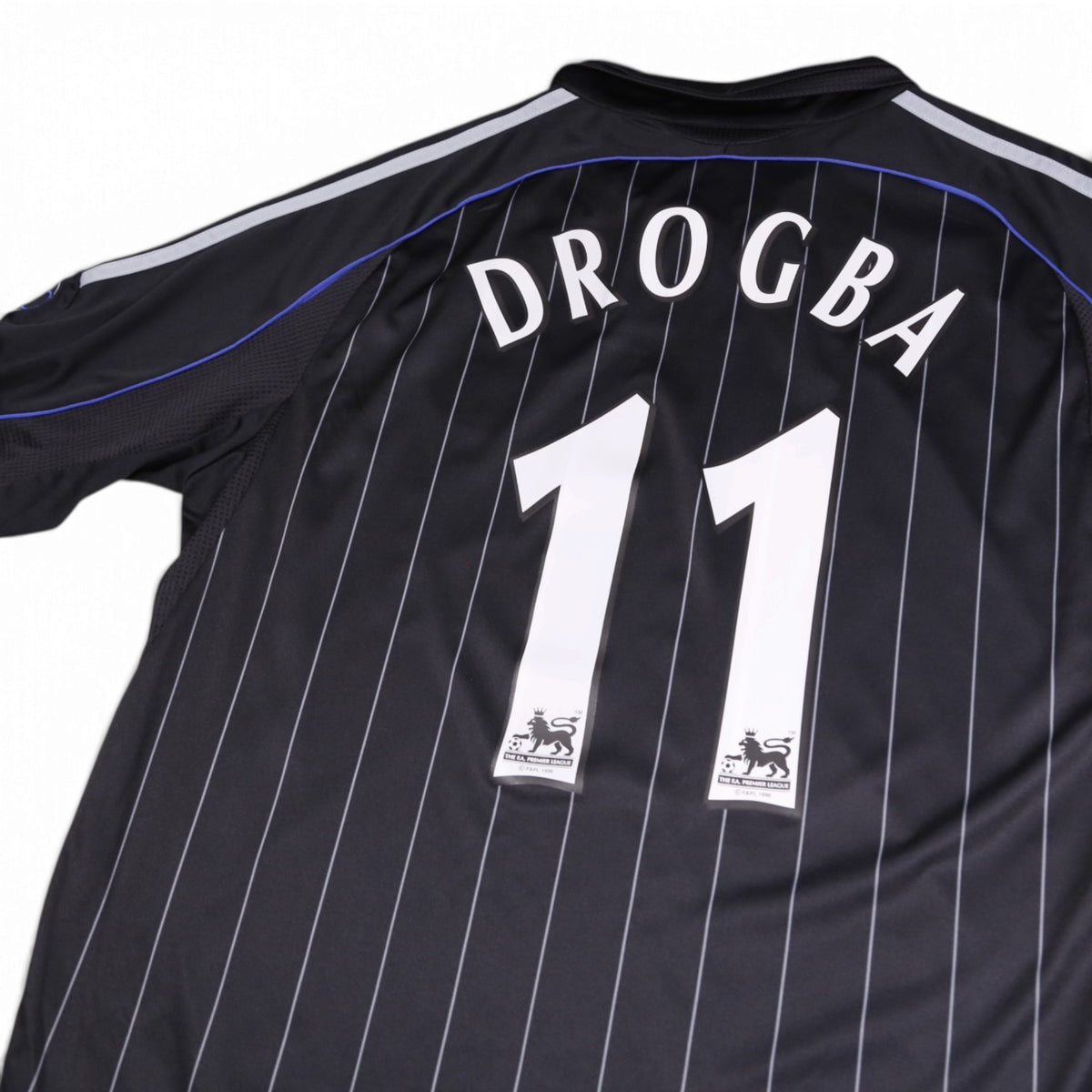 Close-up of Drogba 11 printing and Premier League badges on the back