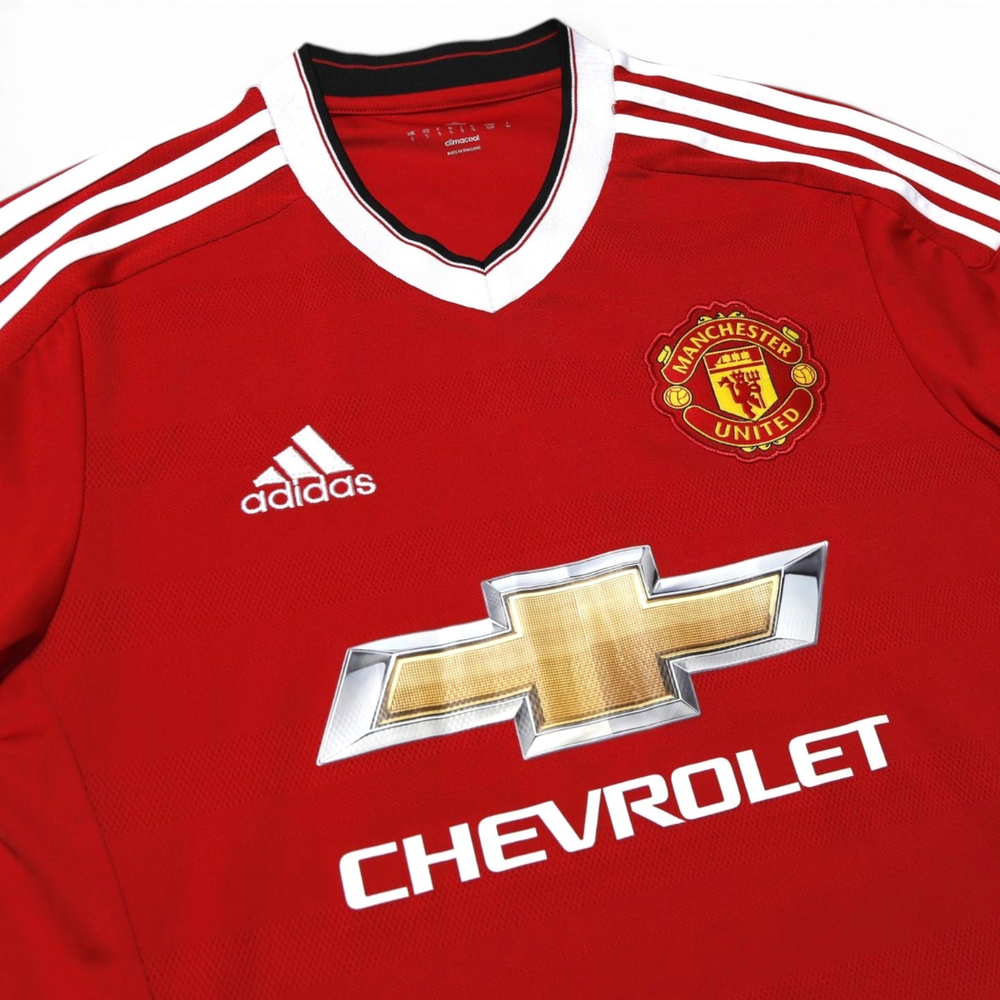 2015-16 Manchester United home shirt front crest and Chevrolet sponsor detail