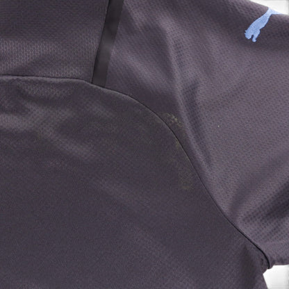 Close-up of the underarm seam area of the shirt showing a faint mark on the fabric.