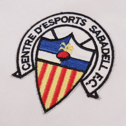 Close-up of the embroidered Centre d'Esports Sabadell F.C. crest
