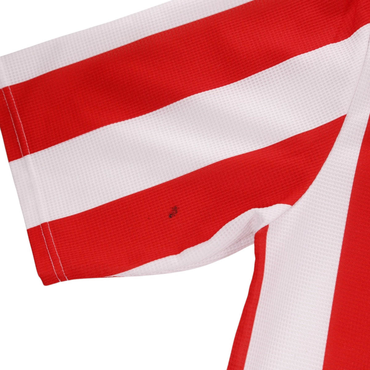 Close-up of a small mark on the sleeve stripe of the Sunderland shirt