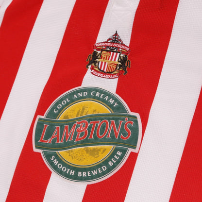 Close-up of Sunderland club crest and Lambton's sponsor logo on the chest
