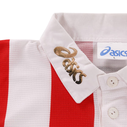 Close-up of Asics logo embroidered on the collar with size label