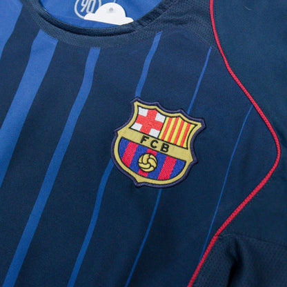 Close-up of the FC Barcelona crest and Nike swoosh on the chest