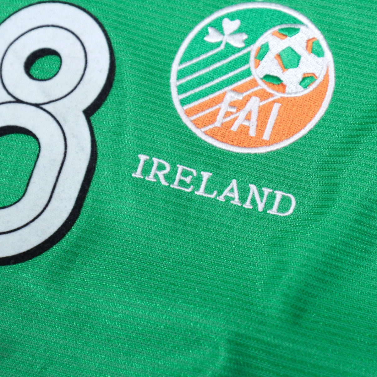 Close-up of the FAI crest and Ireland wordmark on the chest