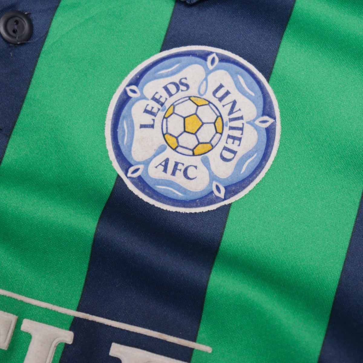 Close-up of the Leeds United AFC crest on the chest