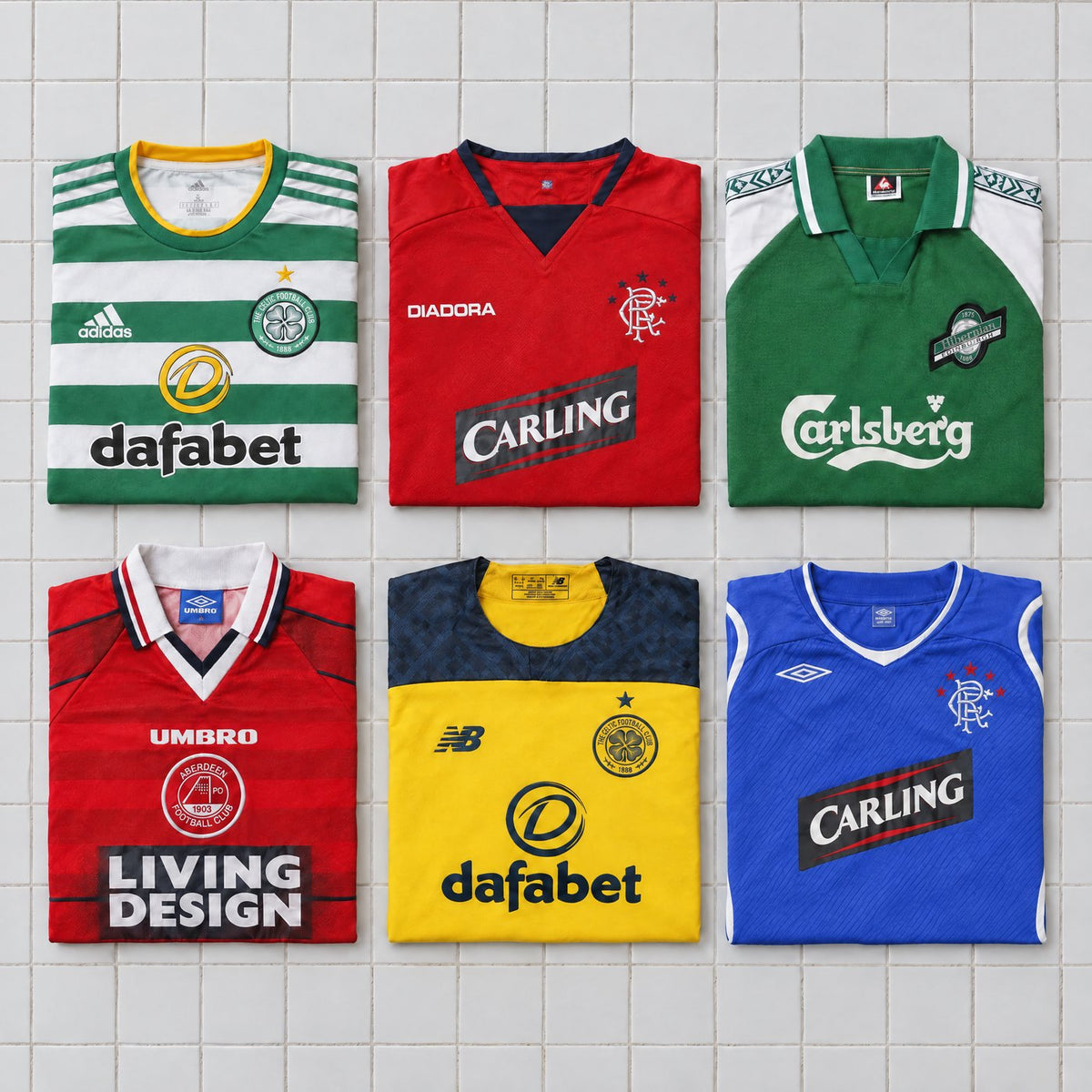 Six Scottish club shirts from the shop folded on white tiles
