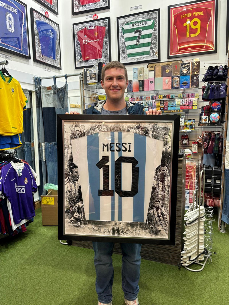 A Forever Vintage customer with the shirt they bought, in the Hanover Street shop