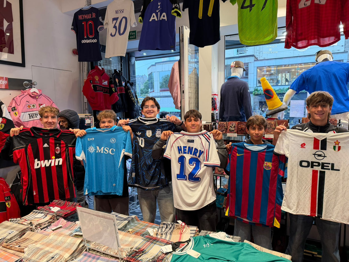 A Forever Vintage customer with the shirt they bought, in the Hanover Street shop