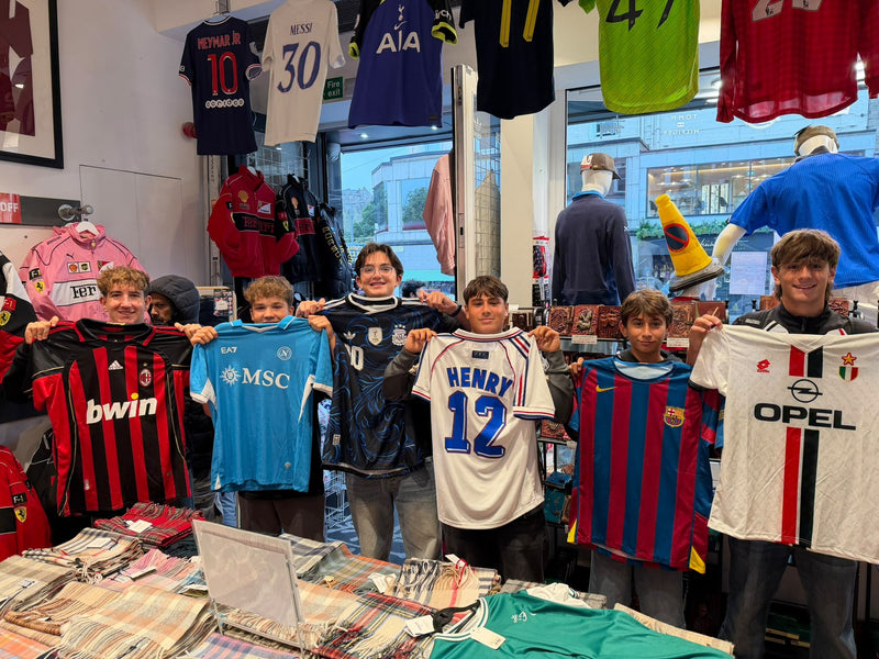 A Forever Vintage customer with the shirt they bought, in the Hanover Street shop