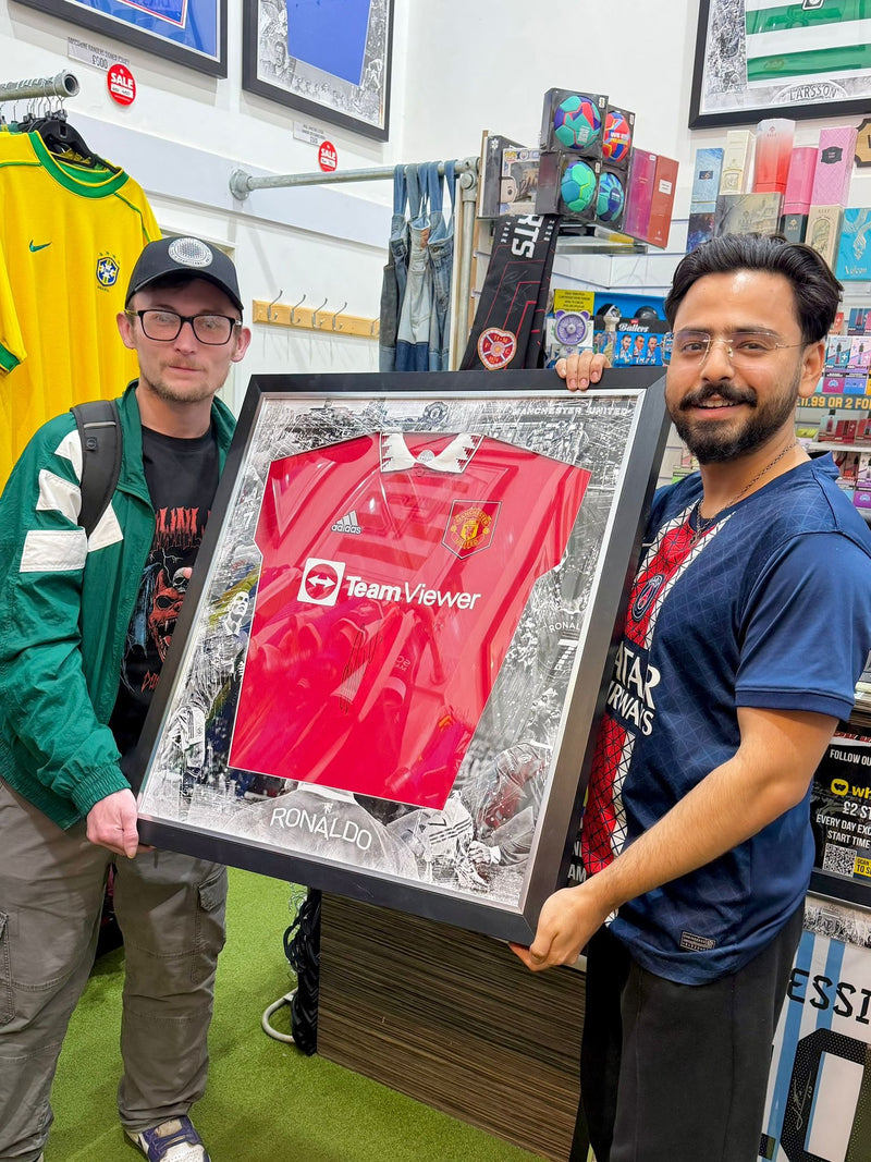 A Forever Vintage customer with the shirt they bought, in the Hanover Street shop