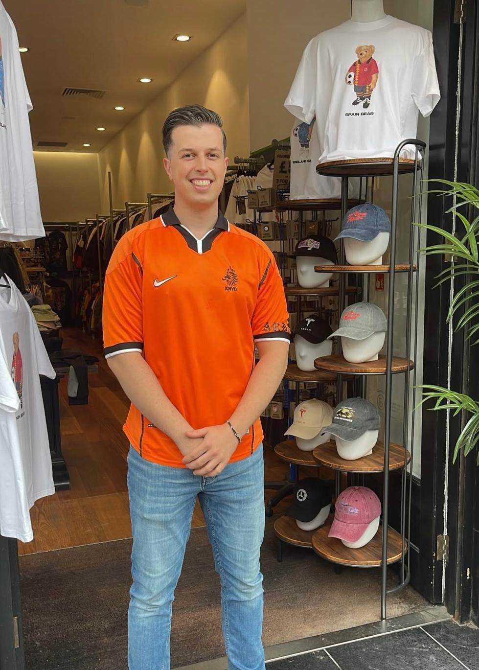 A Forever Vintage customer with the shirt they bought, in the Hanover Street shop
