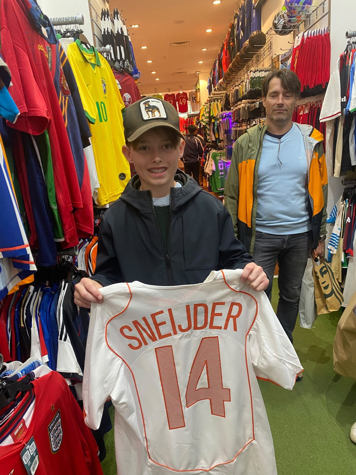 A Forever Vintage customer with the shirt they bought, in the Hanover Street shop